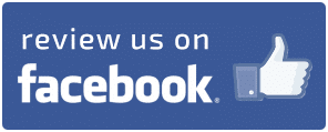 Blue rectangular graphic featuring the text "Review us on Facebook" and a white thumbs-up Like icon on the right, encouraging customers to leave Facebook reviews.